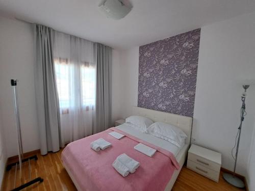 Postel nebo postele na pokoji v ubytování Luxury Apartments Trend