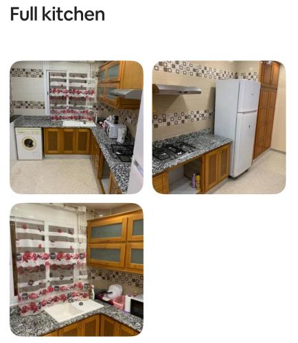 een keuken met houten kasten en een witte koelkast bij Birkhadem Openspace in Alger
