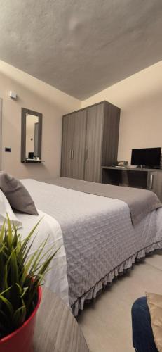 Cama o camas de una habitación en Casa Vacanze Piccolpasso 20