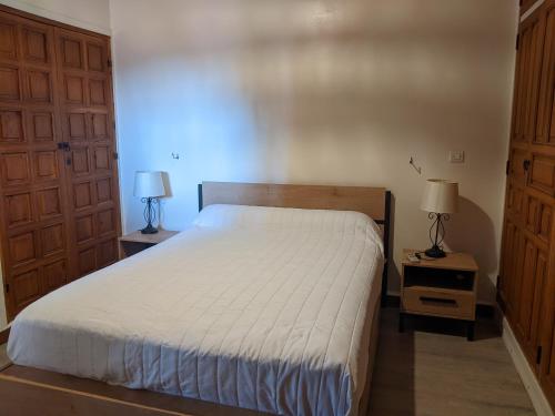 Ένα ή περισσότερα κρεβάτια σε δωμάτιο στο Appartement Palmeraie