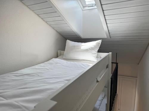 Postel nebo postele na pokoji v ubytování Haus Bergmandl FeWo Vier Jahreszeiten