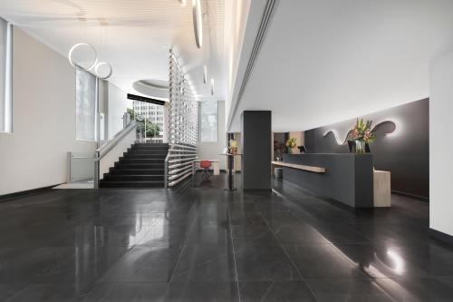 a hallway with a staircase in a building at EXE Liberdade in Lisbon