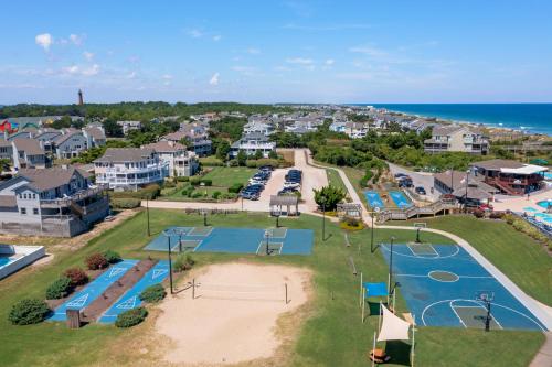 an aerial view of a park with a playground at Let Me Count The Waves in Corolla
