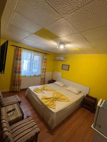 Postel nebo postele na pokoji v ubytování Vila Happy