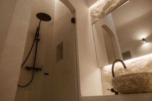 a bathroom with a shower and a sink at Beige Tranquil Escape by the Sea in Matosinhos