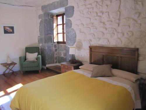 Ένα ή περισσότερα κρεβάτια σε δωμάτιο στο Casona Valle de Soba