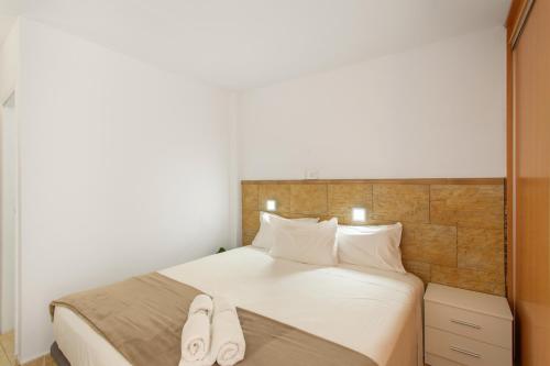 Ένα ή περισσότερα κρεβάτια σε δωμάτιο στο Las Olas Maspalomas