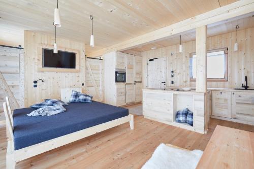 Postel nebo postele na pokoji v ubytování Eco Chalet Blasla