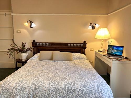 Postel nebo postele na pokoji v ubytování bed and breakfast mery sorrento