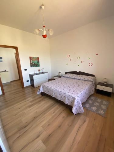 Postel nebo postele na pokoji v ubytování Casa Oristano Mare & Città