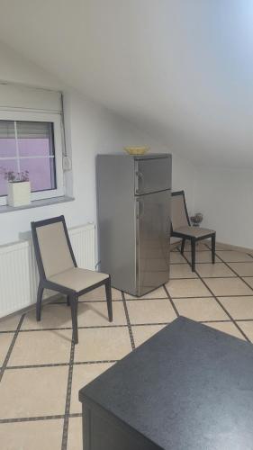 Кухня или мини-кухня в Lena apartment
