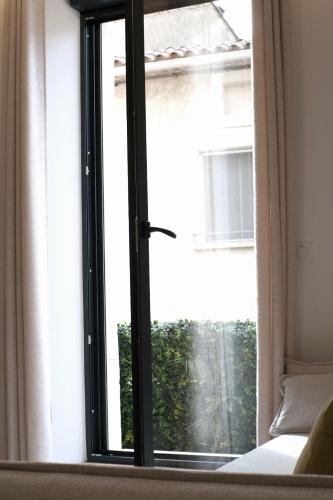 Gambar di galeri bagi L'Ancien Cinéma - Appartement de charme di Bize-Minervois