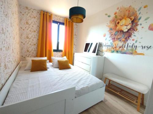 En eller flere senge i et værelse på La maison des moments