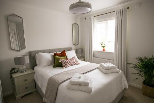 Ένα ή περισσότερα κρεβάτια σε δωμάτιο στο Your home away from home