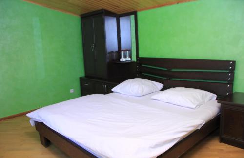 Postel nebo postele na pokoji v ubytování Resort MJA
