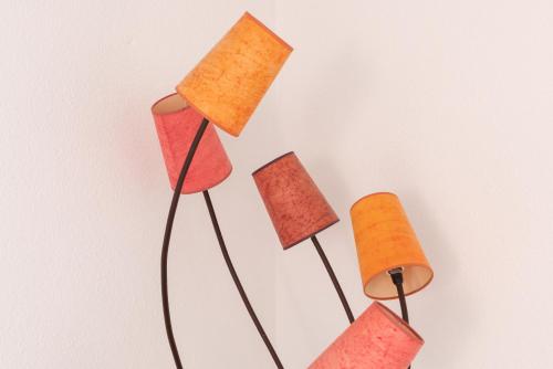 a group of four objects hanging on a wall at Corniche Azur YourHostHelper in Sète