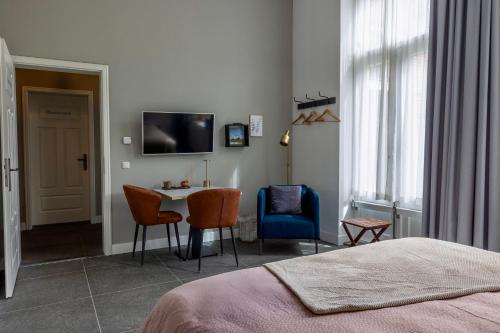 Katil atau katil-katil dalam bilik di "In de Kloosterhof" Gratis privé parkeren