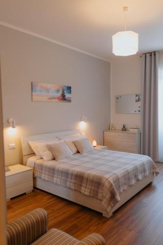 Una cama o camas en una habitación de House by Naty