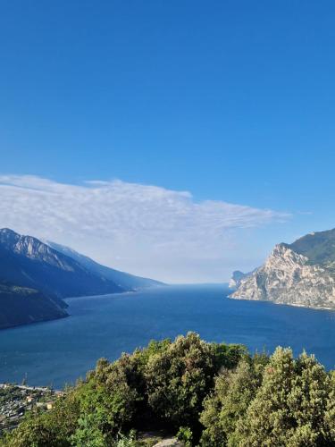 a view of a large body of water with mountains at Apartment Sweet Retreat in Dro