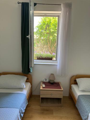 Apartments Unoにあるベッド