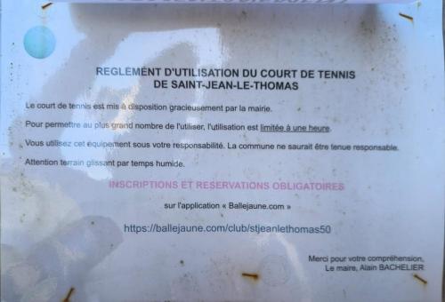 a sign that says replacementlictionlictionitution do court dont be terms dmg smarm at appartement proche de la Baie du Mont saint Michel in Saint-Jean-le-Thomas