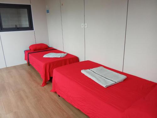 Ένα ή περισσότερα κρεβάτια σε δωμάτιο στο Coruña Backpackers Hostel