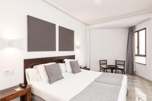 Postel nebo postele na pokoji v ubytování Hotel Valle Aridane