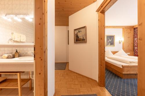 Posteľ alebo postele v izbe v ubytovaní Aparthaus Camping Stubai