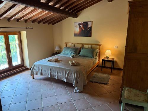 a bedroom with a bed in a room at Affittacamere Del Piano - Private Parking in Orvieto Scalo