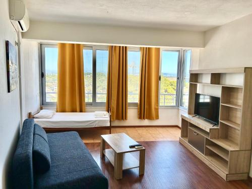 Ένα ή περισσότερα κρεβάτια σε δωμάτιο στο Romantica Apartments
