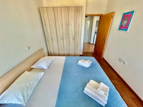 Ένα ή περισσότερα κρεβάτια σε δωμάτιο στο Romantica Apartments