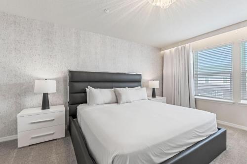 Кровать или кровати в номере 1287 Blue Paradise Way