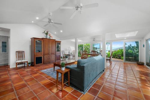 a living room with a couch and a table at Alaeloa 35 in Kapalua