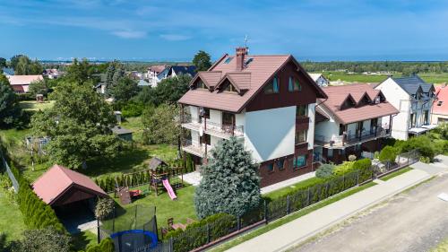 Alex - Pokoje i Apartamenty Blisko Plaży z Ogrodem i Placem Zabaw