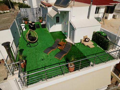 an aerial view of a miniature house with a yard at F & B Collection - Alonnisos in Patitiri