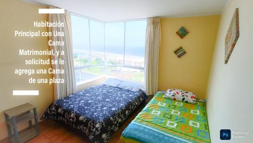 a bedroom with a bed and a large window at FRENTE AL MAR en SAN MIGUEL Apartamento LIMA CHECK IN in Lima