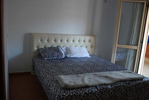 Llit o llits en una habitació de Lily apartment
