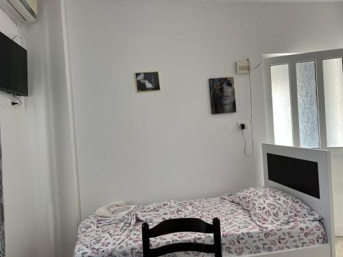 Кровать или кровати в номере Vila Erioni Ksamil
