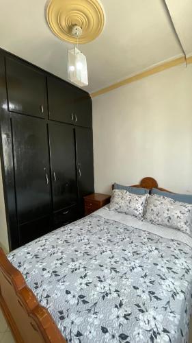 Postel nebo postele na pokoji v ubytování Appartement Familial avec Parking Sécurisé