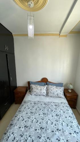Postel nebo postele na pokoji v ubytování Appartement Familial avec Parking Sécurisé
