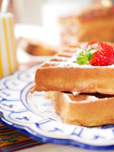 a piece of bread with a strawberry on a plate at Moulin de Saint Jacques 