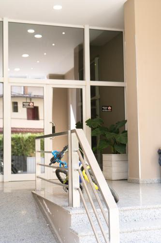 a person doing a trick on a skateboard on a rail at Liora Seaview Apartments in Shëngjin