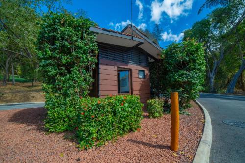 a small building on the side of a road at Casa Lagom, Luxurious Oasis with Infinity Pool! in La Cruz