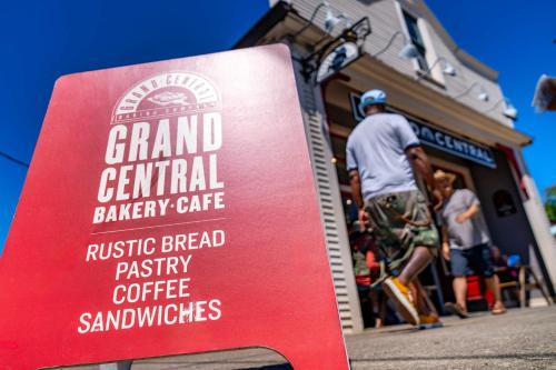 a sign for a grand central bakery cafe in front of a store at Stay Portland - Super Studio in Brooklyn in Portland