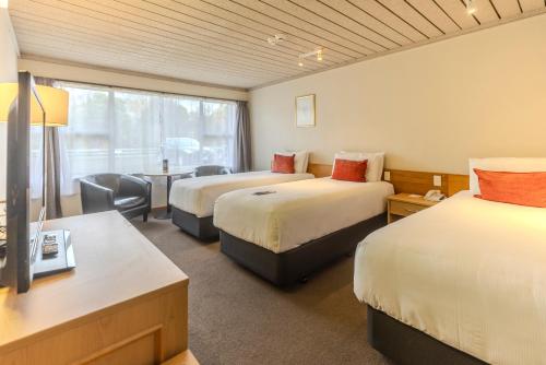 Postel nebo postele na pokoji v ubytování Kingsgate Hotel Te Anau