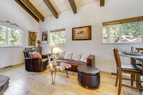 a living room with a couch and a table at Walk to Diamond Peak Luxe Chalet with Mtn-View Deck in Incline Village