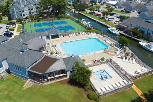 an aerial view of a house with a large swimming pool at The Hook in Manteo