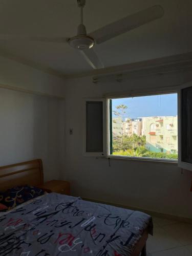 Ένα ή περισσότερα κρεβάτια σε δωμάτιο στο Aghadir Village قرية اغادير