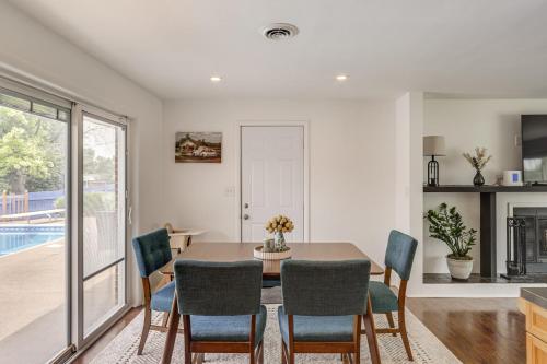 a dining room with a table and chairs at Dayton Family Home with Game Room Walk to City Park in Dayton