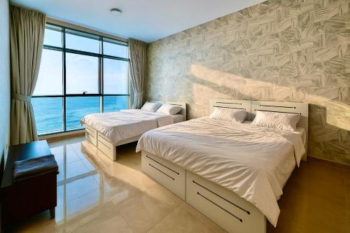 Luxury Ajman Sunrise 2BD Stay with sea view & Pool